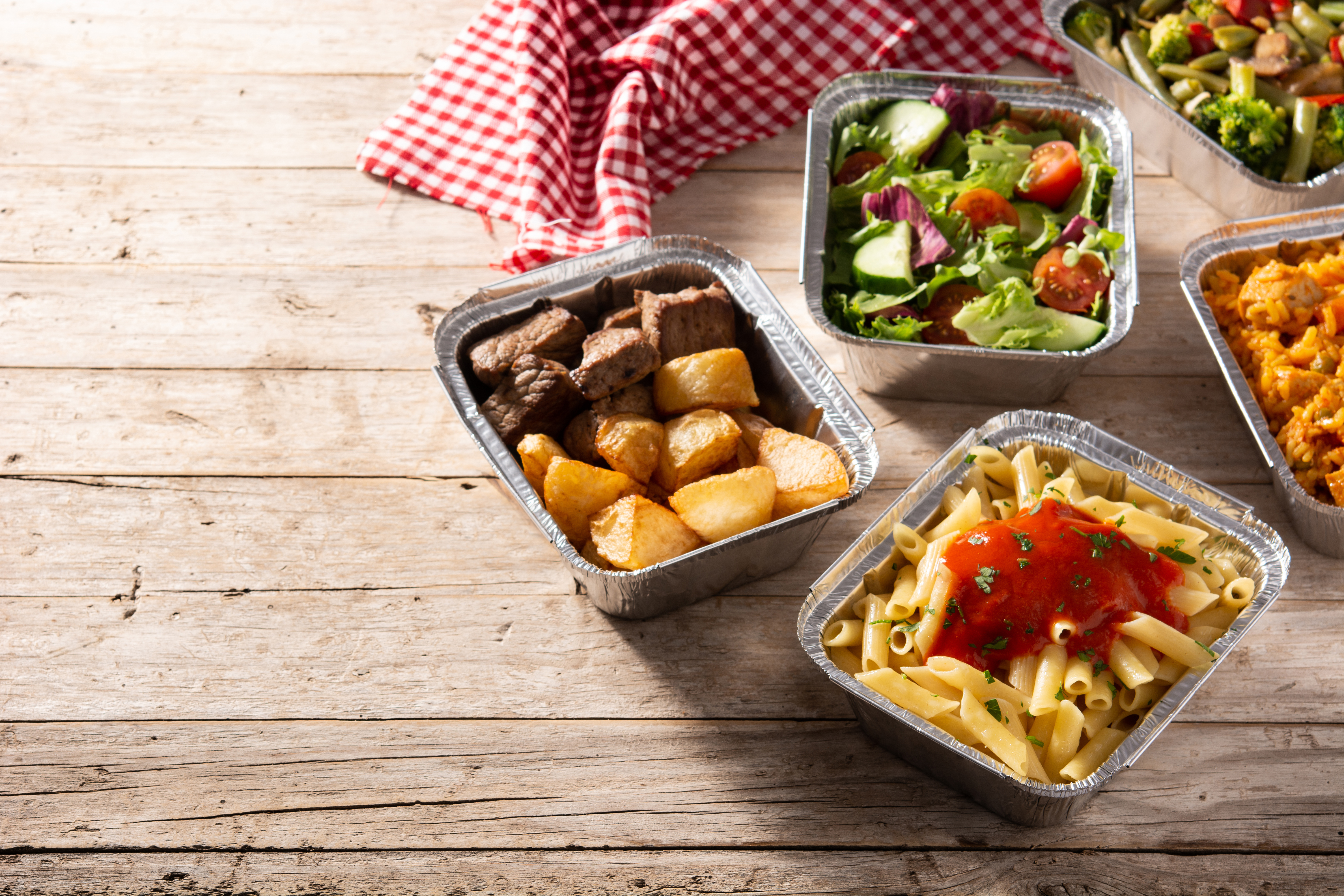 A selection of different meals in foil trays