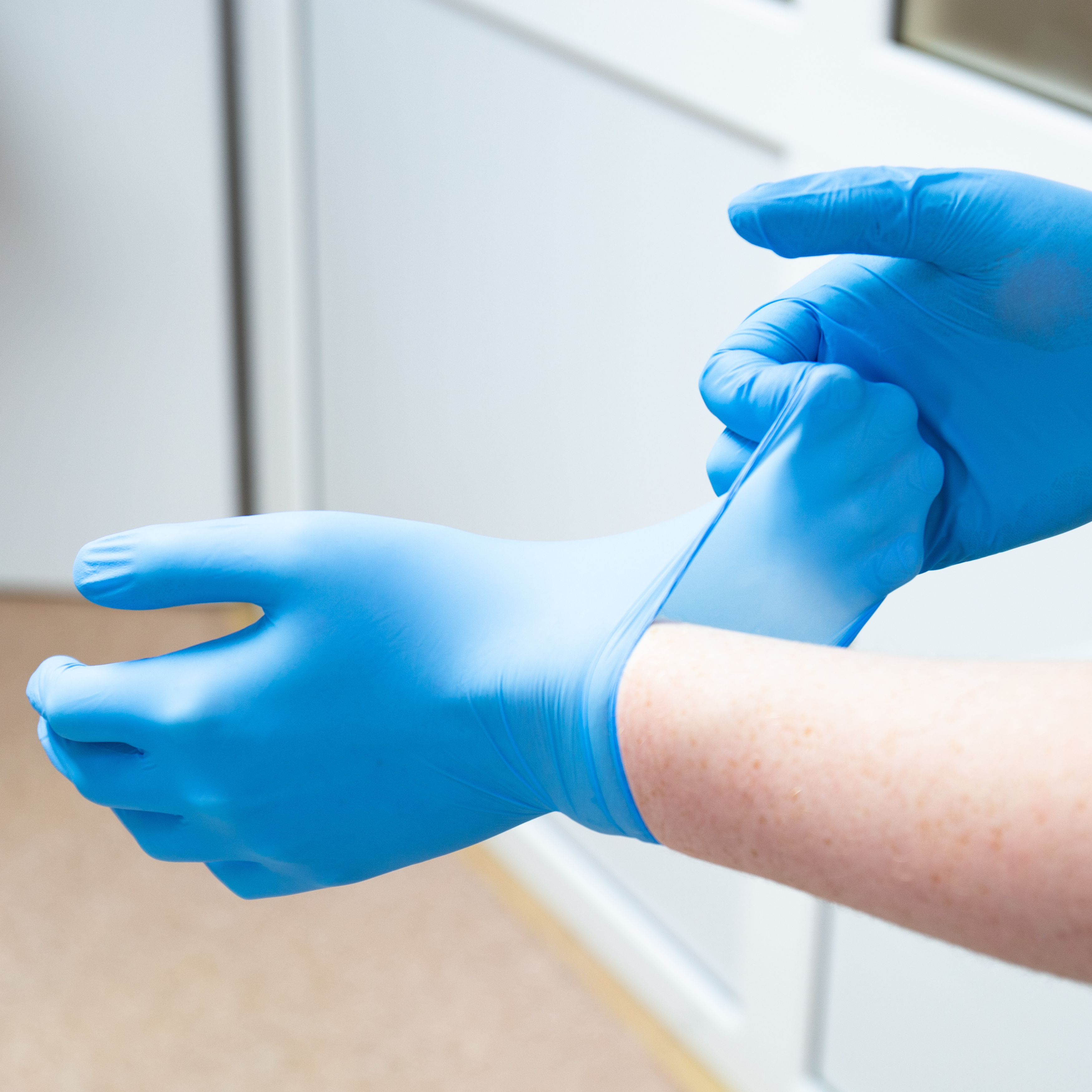 Progenics Nitrile Blue Gloves on hands
